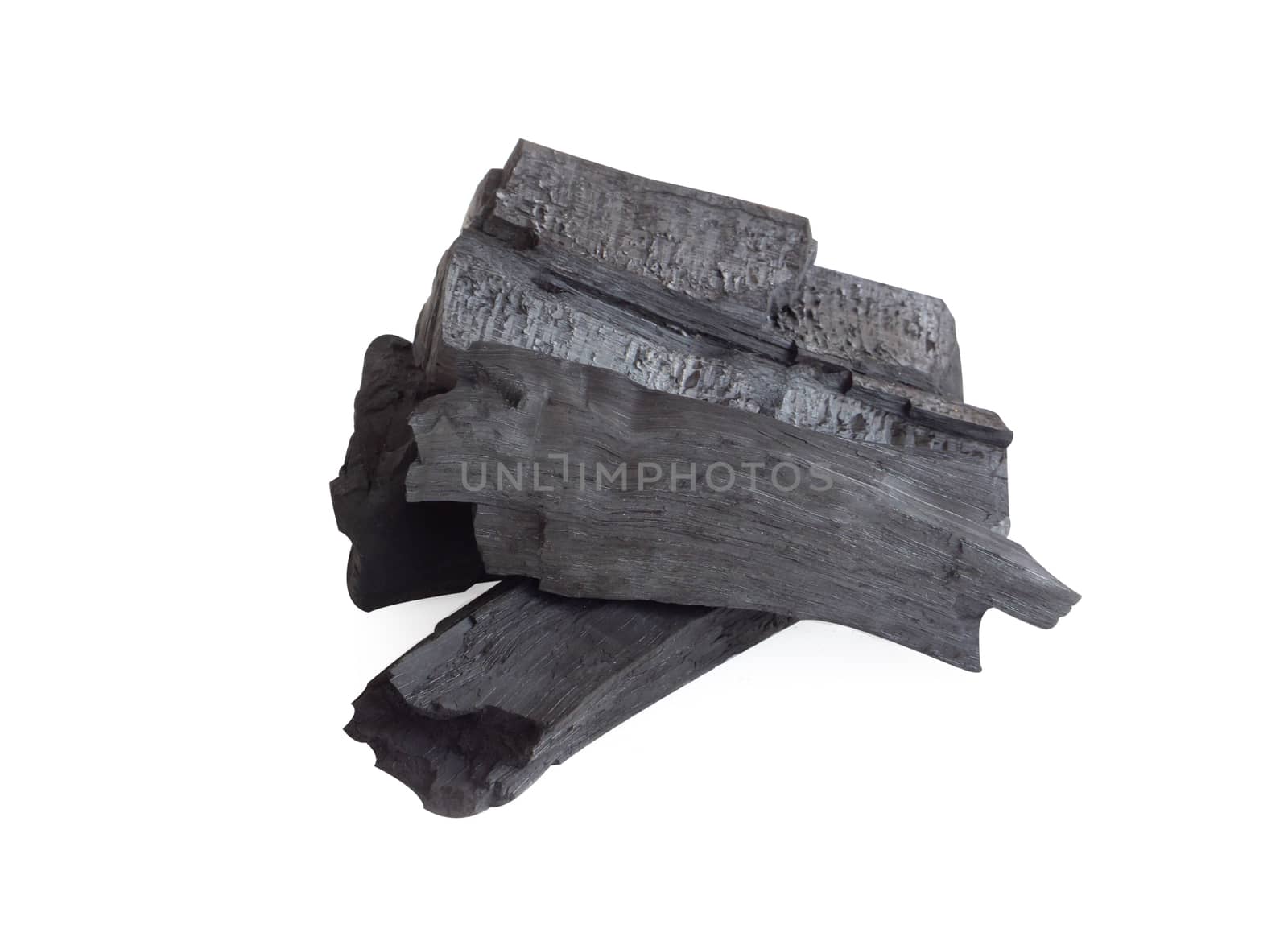 Natural black charcoal isolated on white background