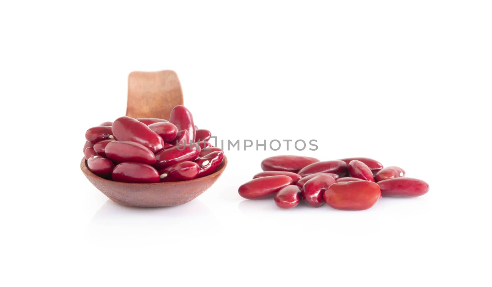 Red kidney beans in wood spoon isolated on white background, healthy food concept