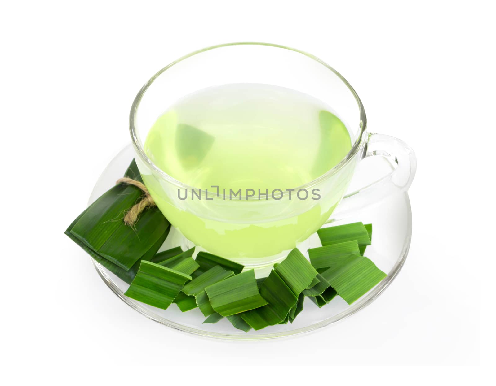 Glass of pandan juice with green leaves isolated on white background
