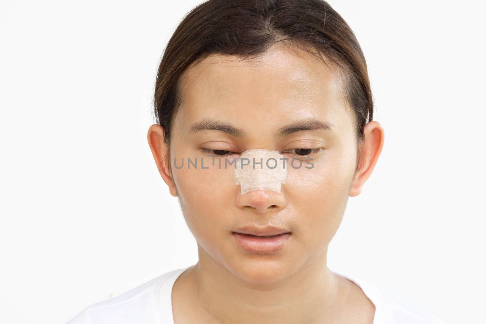 Close up face of asian woman with nose plastic surgery for beaut by pt.pongsak@gmail.com