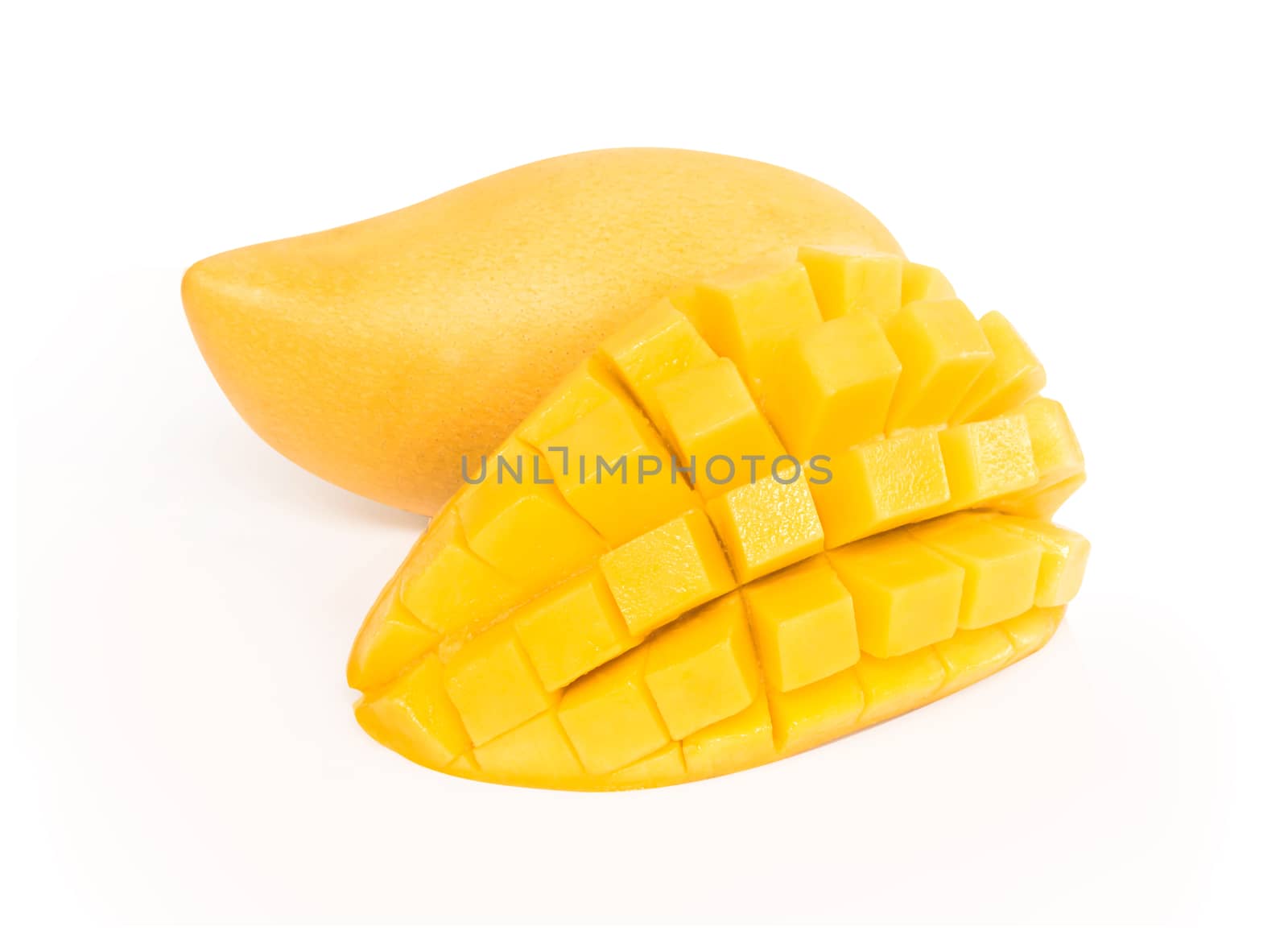 Closeup ripe mango tropical fruit with slice isolated on white background