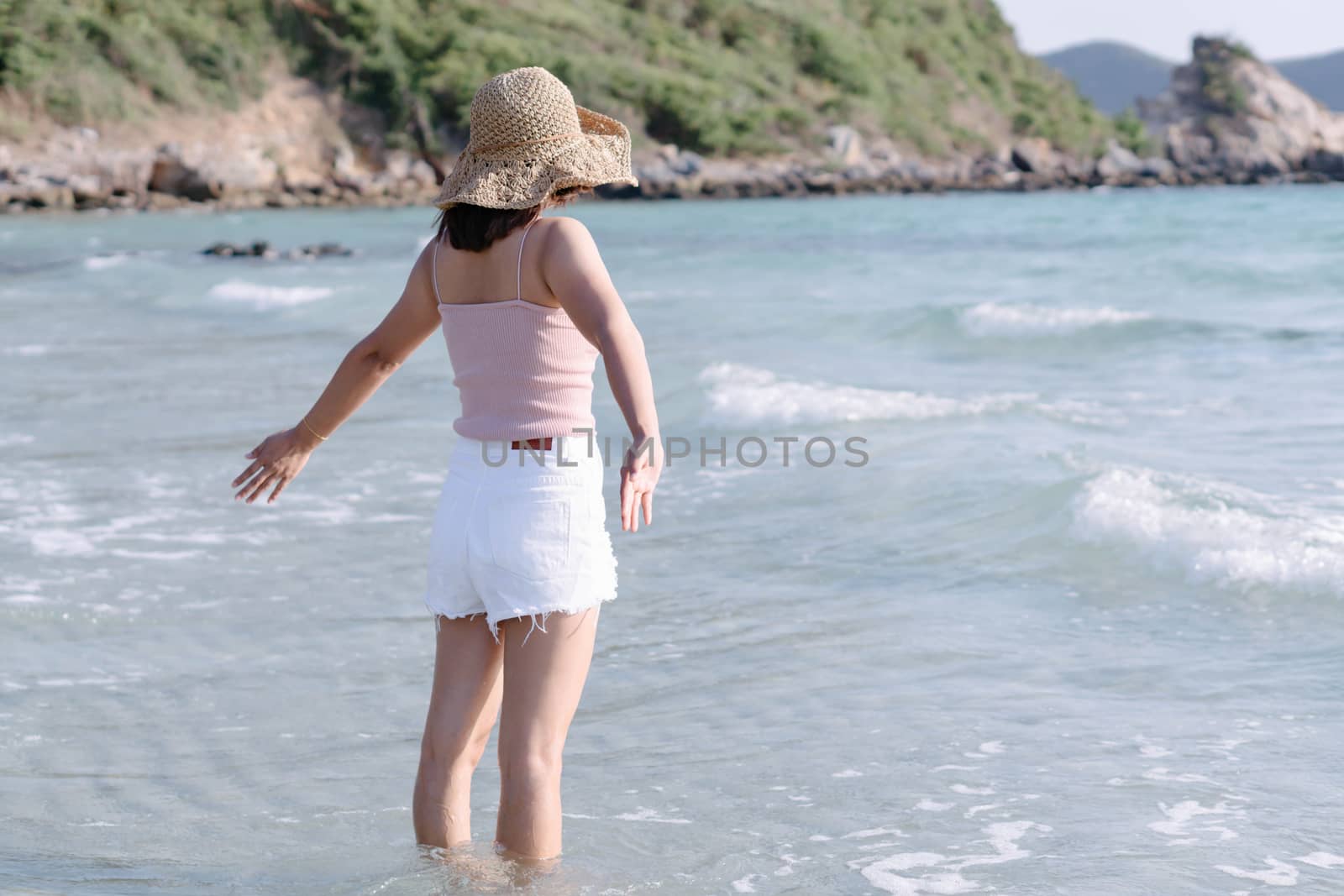 Closeup woman looking to sea with relax feeling in tropical summ by pt.pongsak@gmail.com