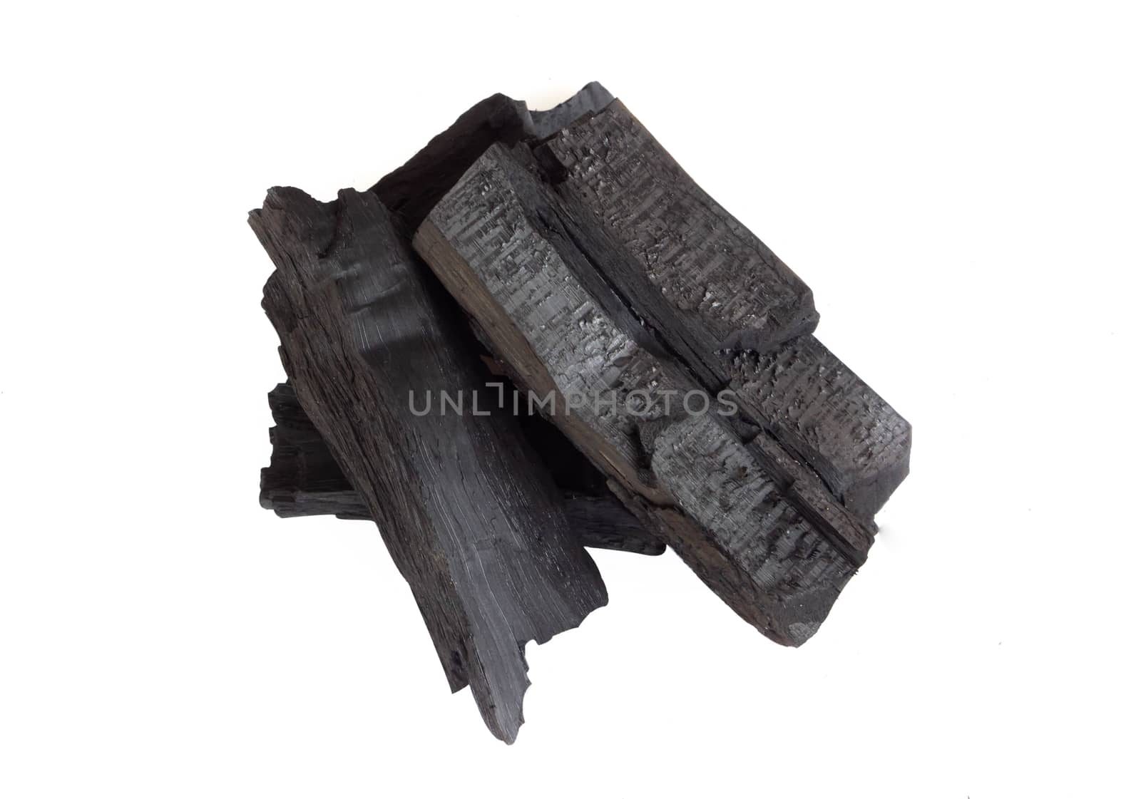 Natural black charcoal isolated on white background