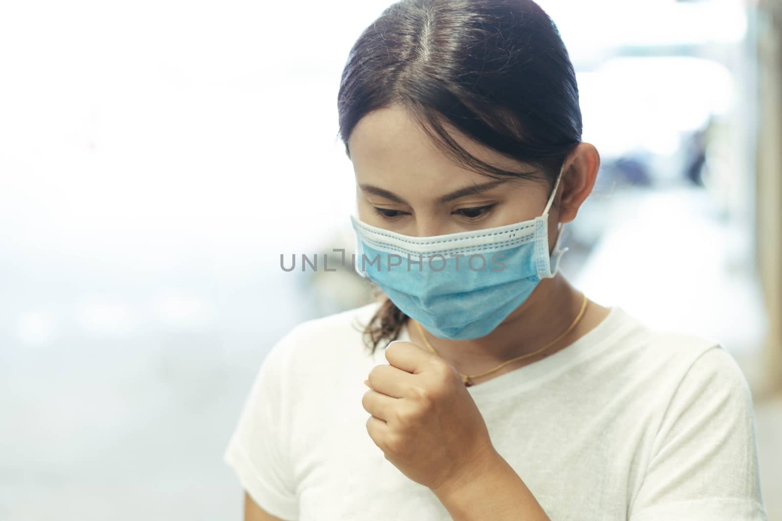 Closeup woman wearing face mask for protect air polution or viru by pt.pongsak@gmail.com