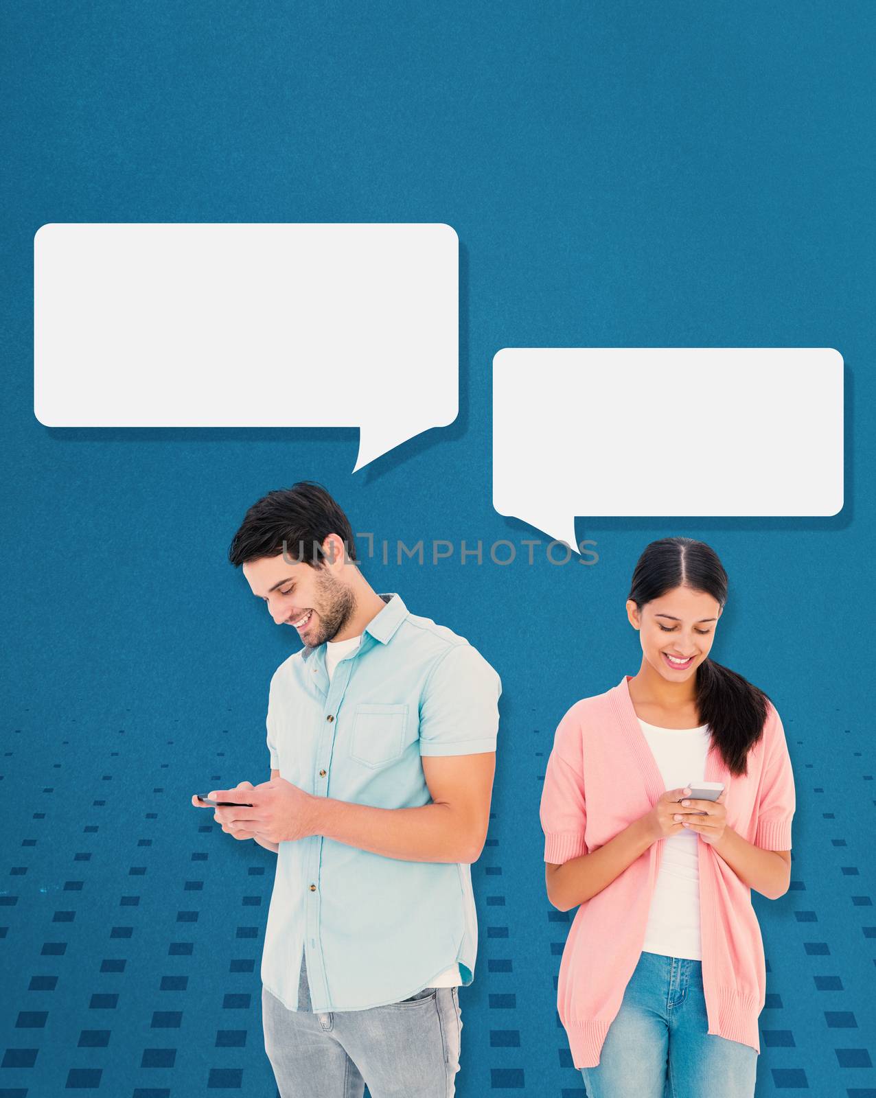 Happy couple sending text messages against blue