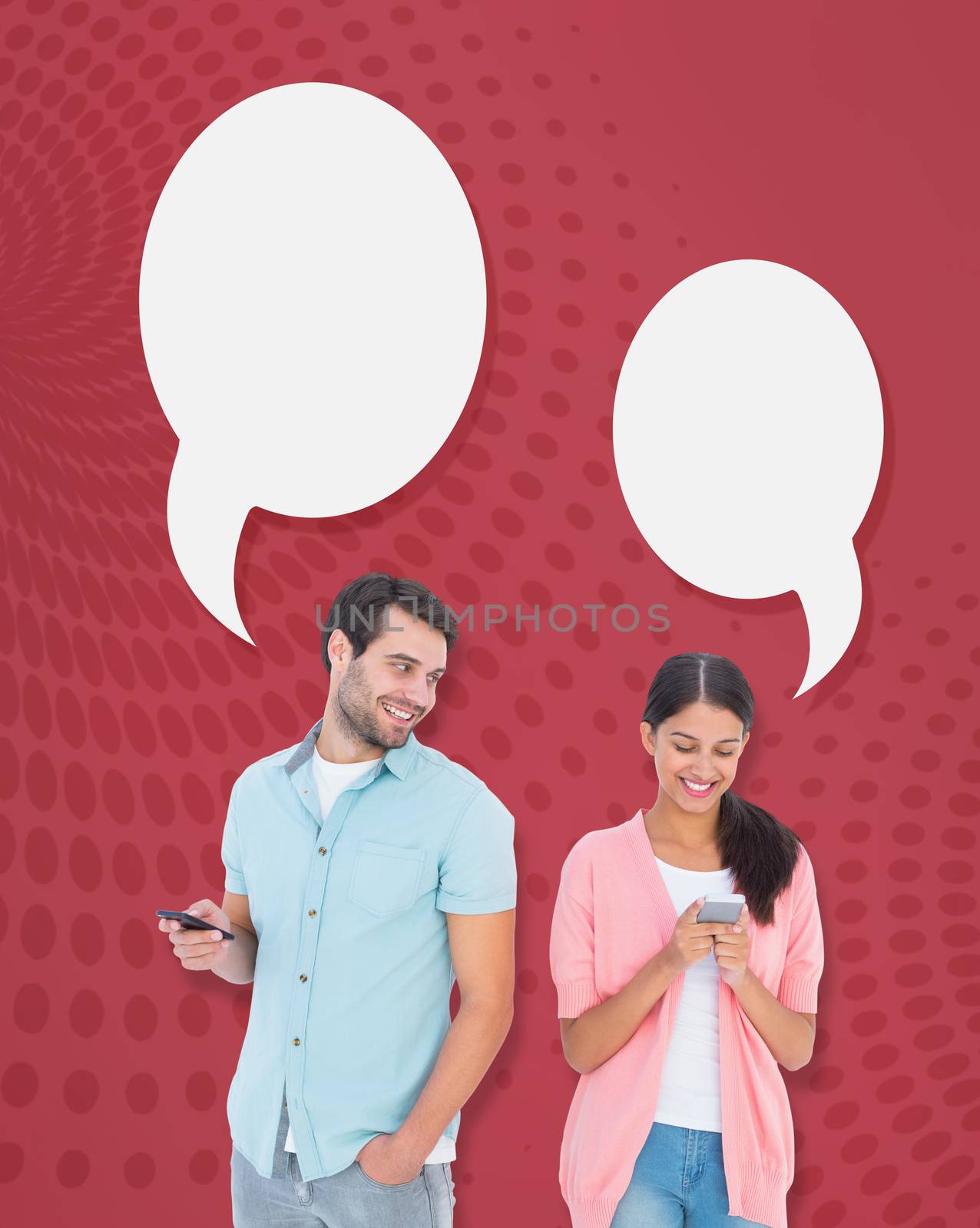 Happy couple sending text messages against red