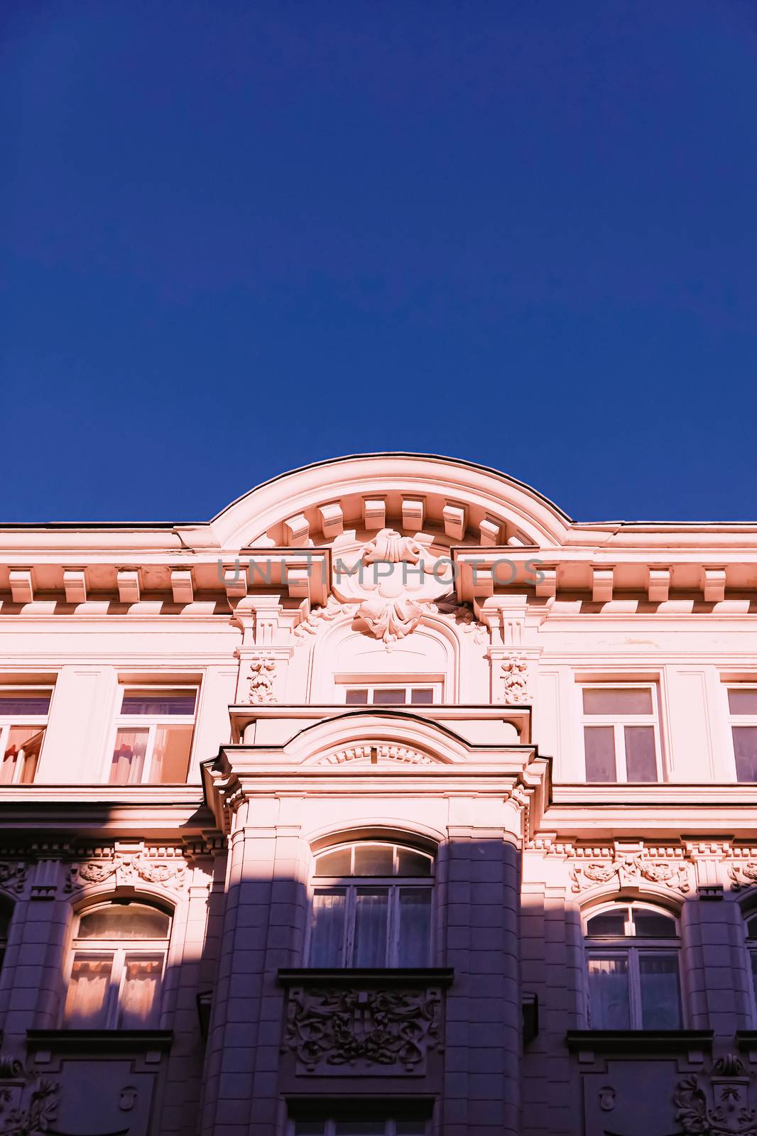 Exterior facade of classic building in the European city, architecture and design by Anneleven