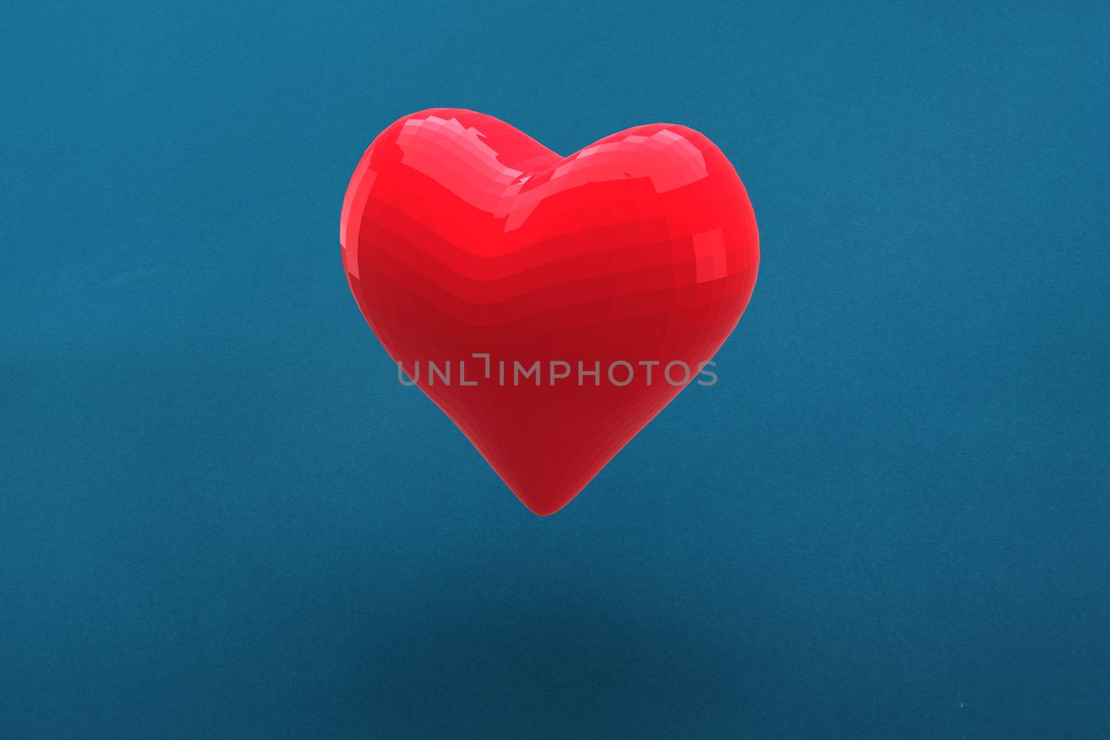 Red heart shaped balloon by Wavebreakmedia