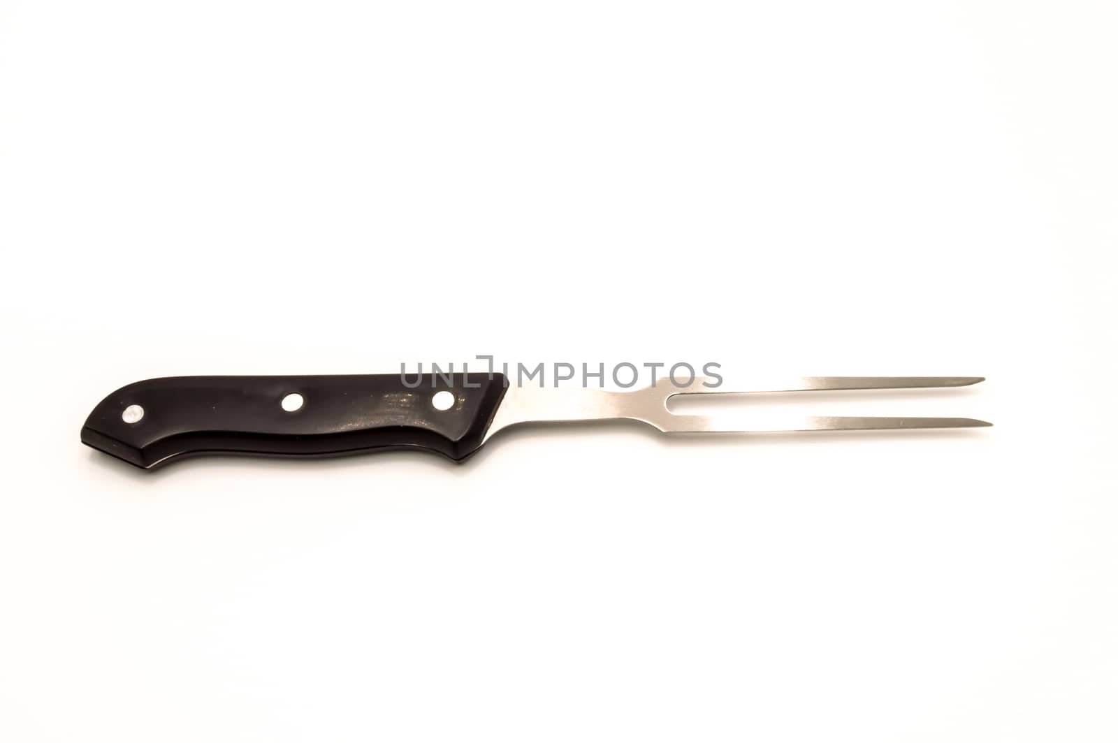 Meat fork with a black wooden handle, isolated on a white background