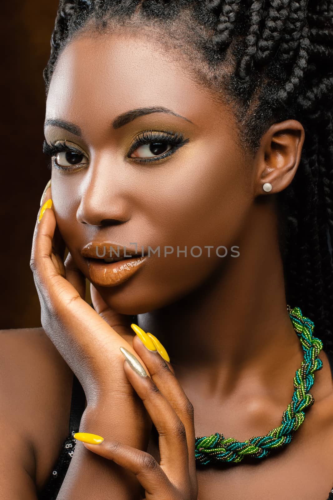 African cosmetic portrait of young woman. by karelnoppe