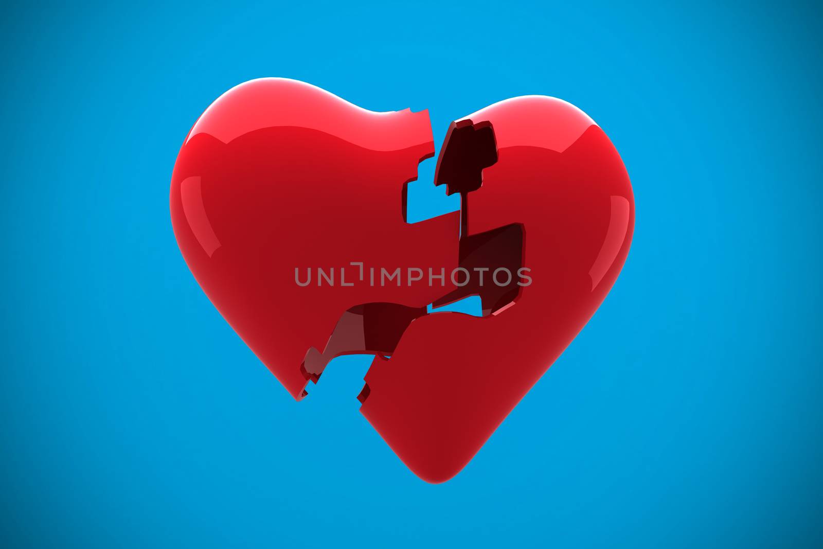 Broken heart against blue background with vignette