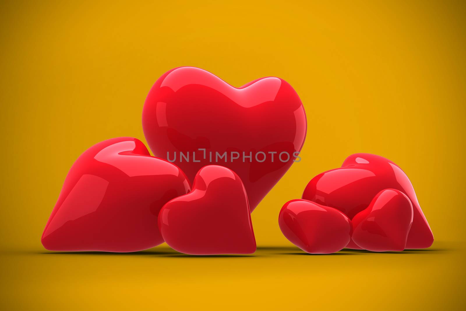 Love hearts against yellow background with vignette