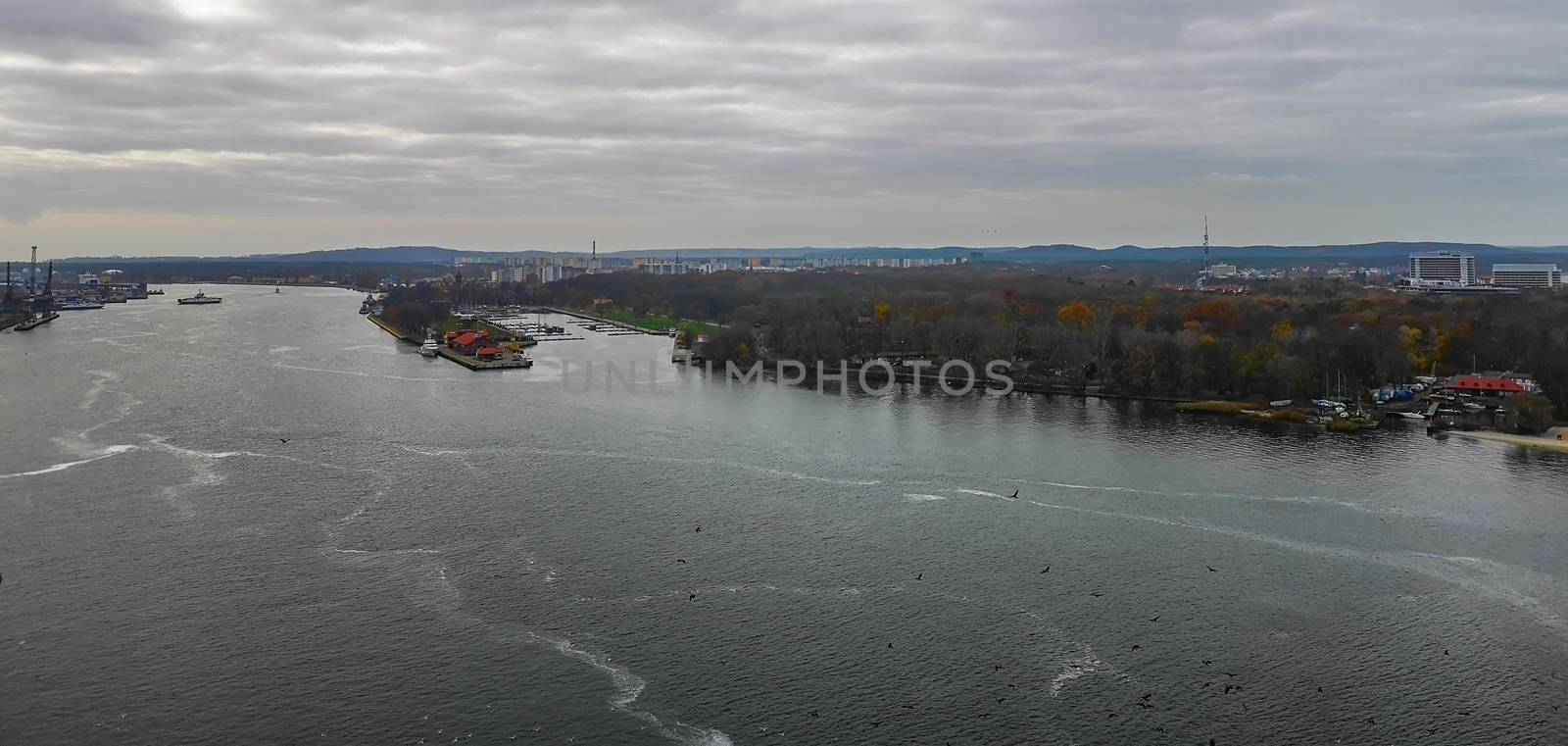 Look from Lighthouse in Swinoujscie to park and sea channel and sea at fall in November