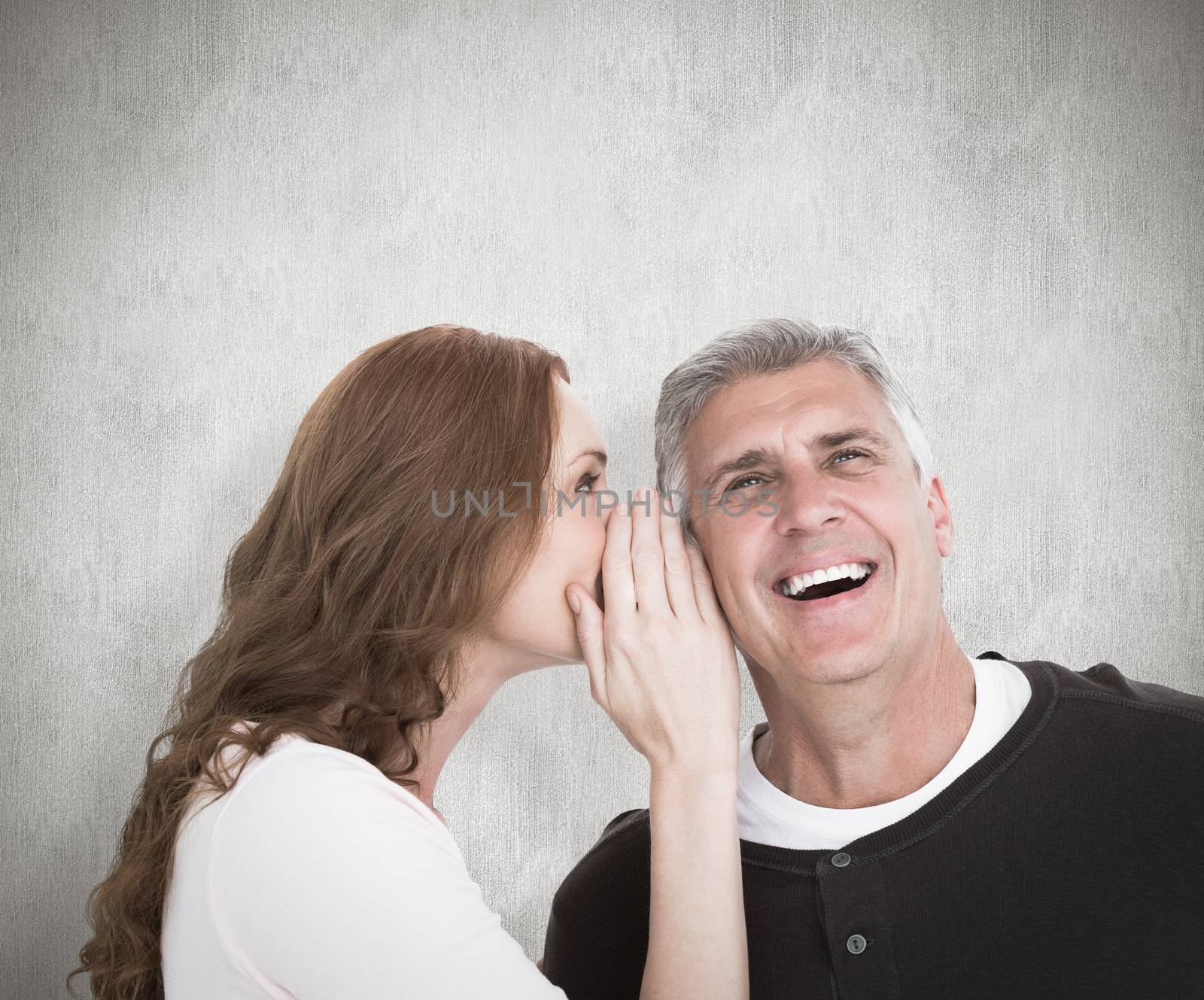Woman telling secret to her partner against white background
