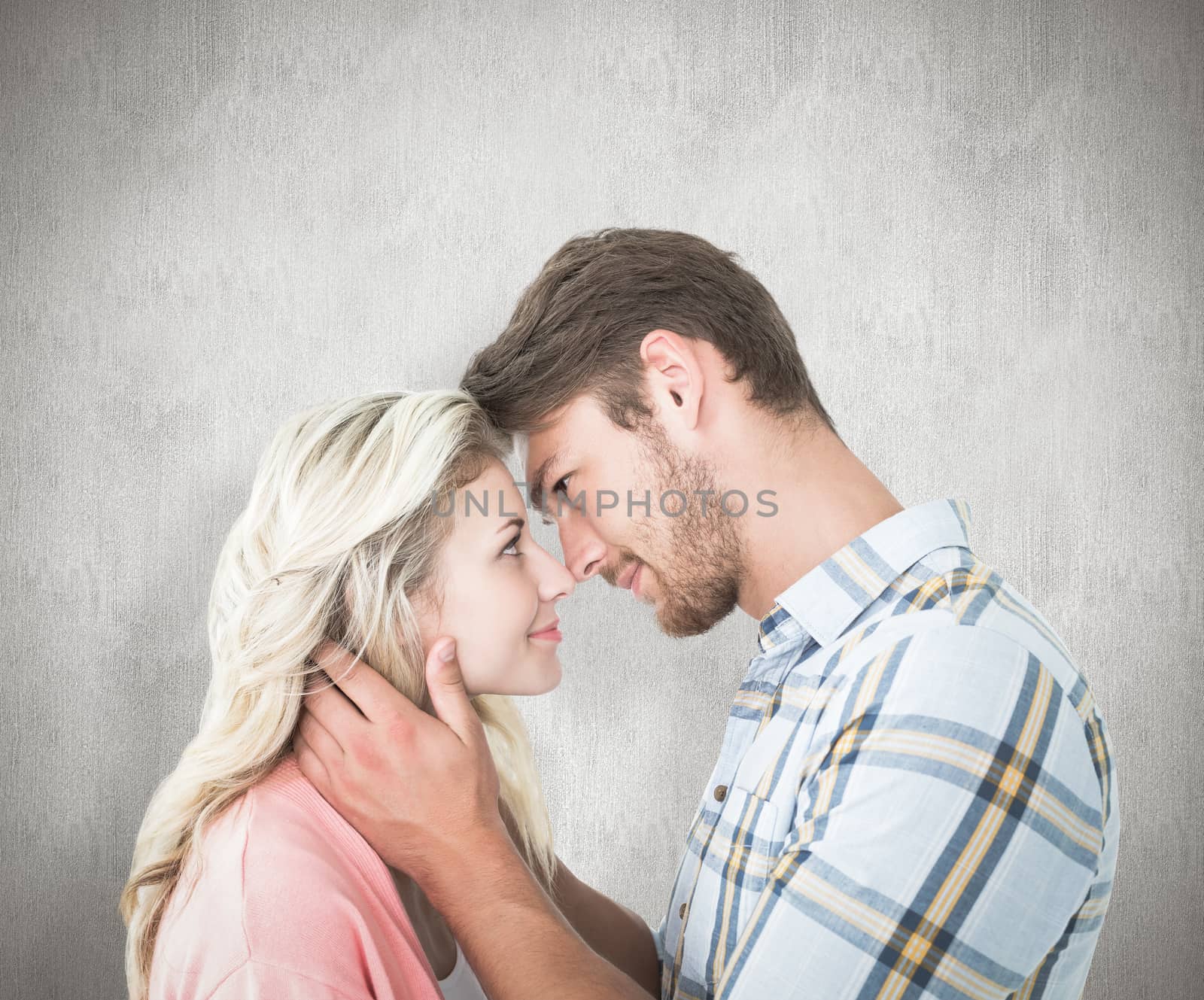 Composite image of attractive couple smiling at each other by Wavebreakmedia
