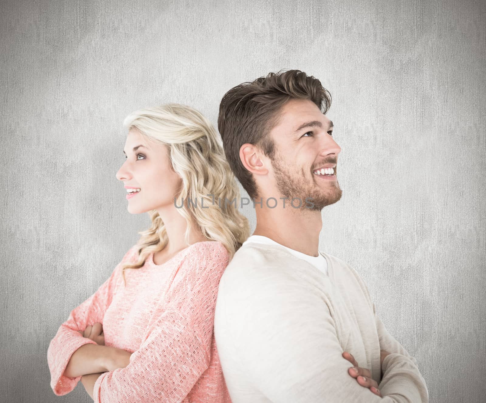 Composite image of attractive couple smiling with arms crossed by Wavebreakmedia