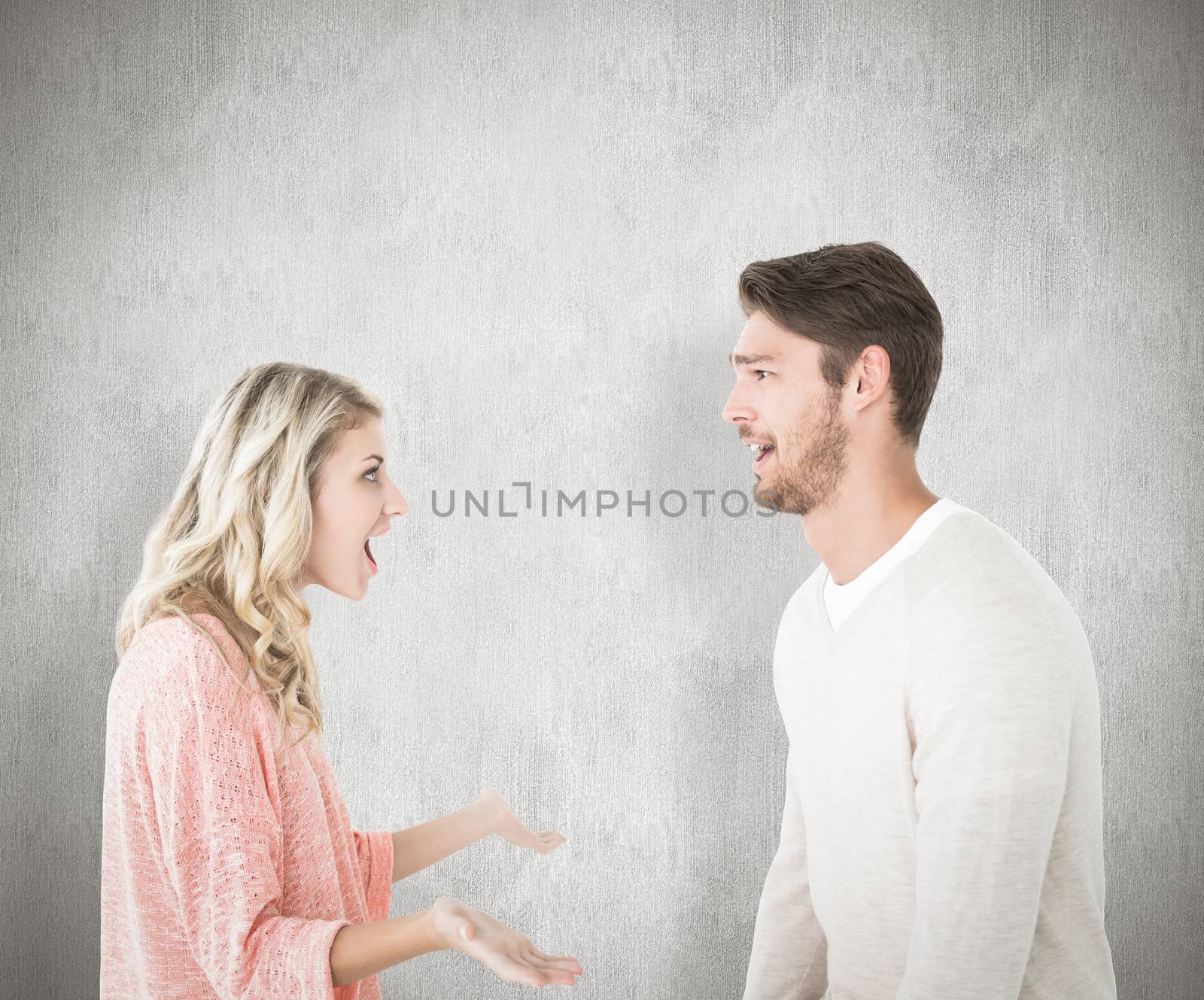 Composite image of attractive couple talking about something shocking by Wavebreakmedia