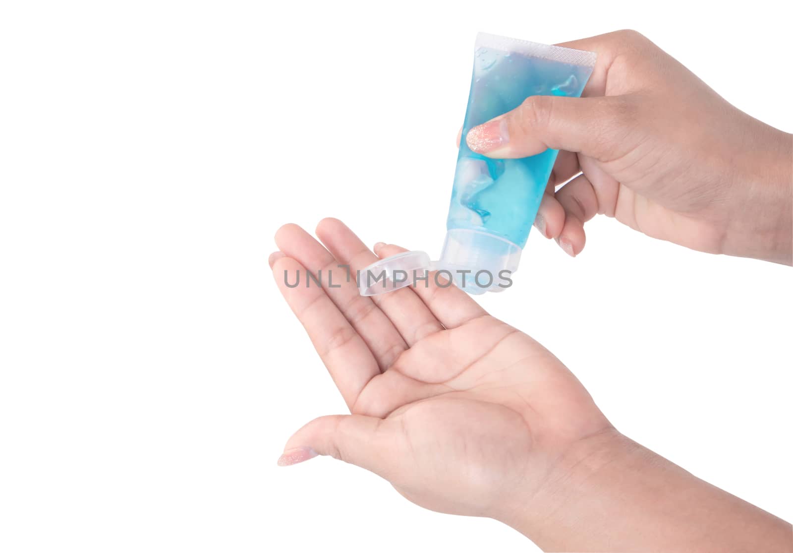 Woman hand using alcohol gel in plastic tube for washing hand, health care and medical concept