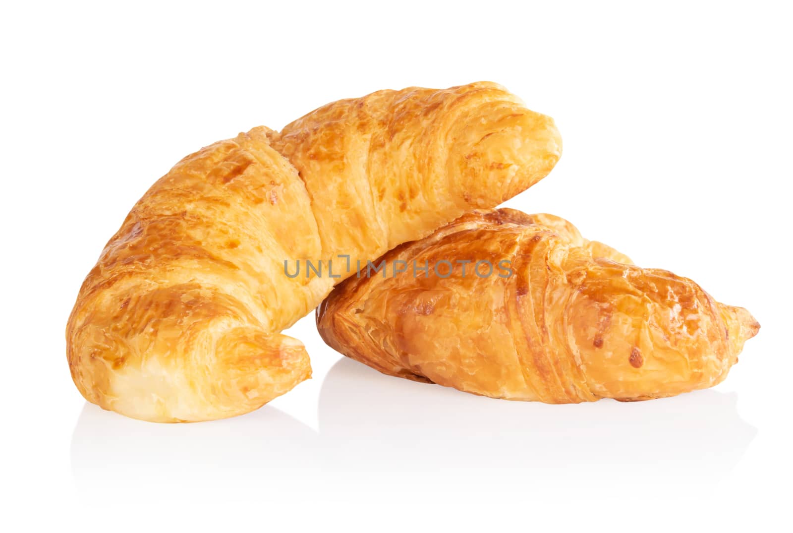 Fresh croissants isolated on white background