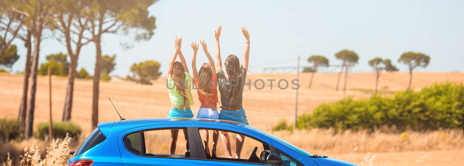 Summer car trip and young family on vacation by travnikovstudio
