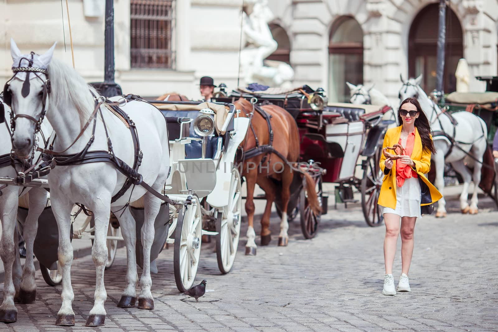 Woman walking in city. Young attractive tourist outdoors in italian city by travnikovstudio