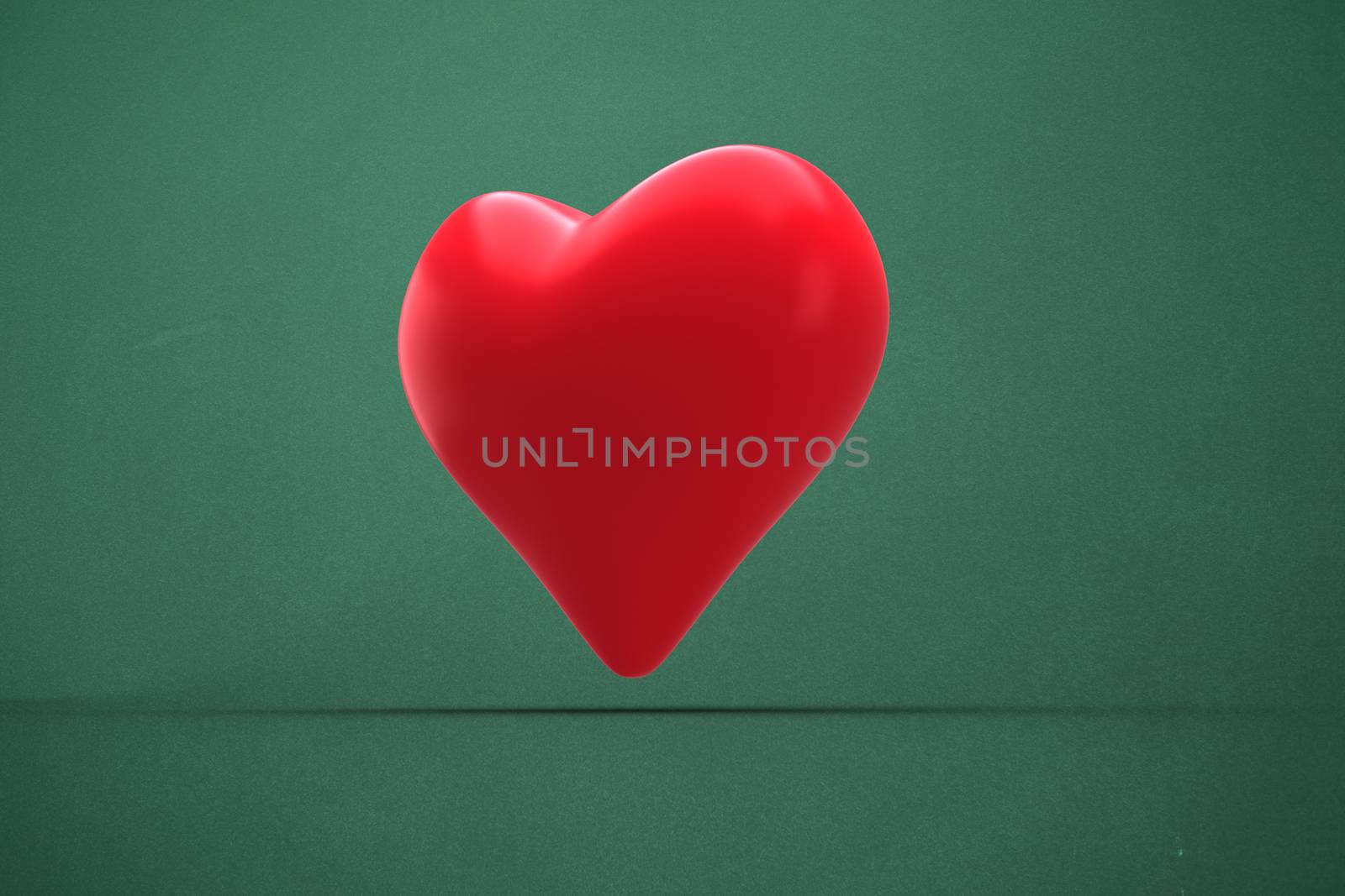 Red heart against green