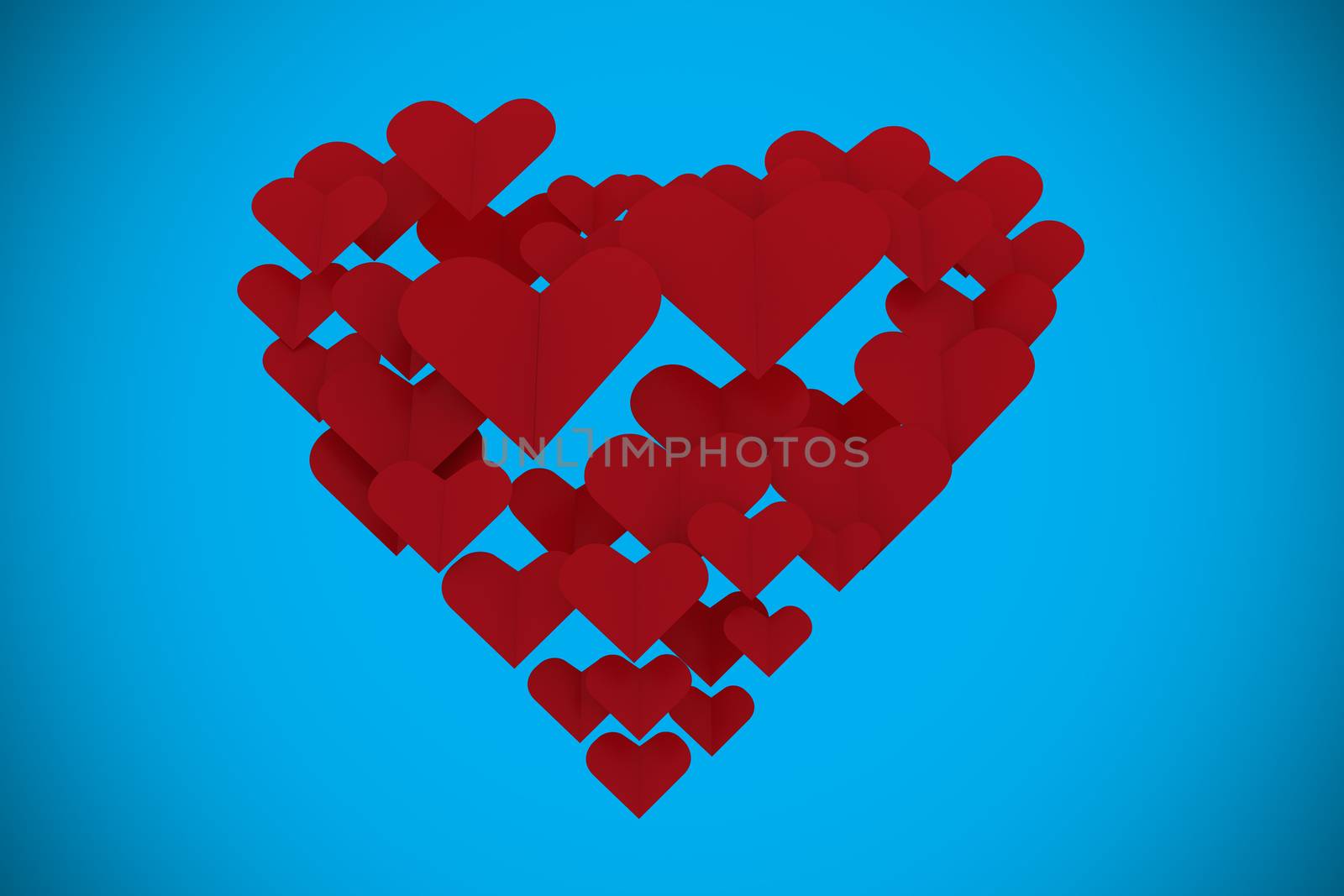 Love hearts against blue background with vignette