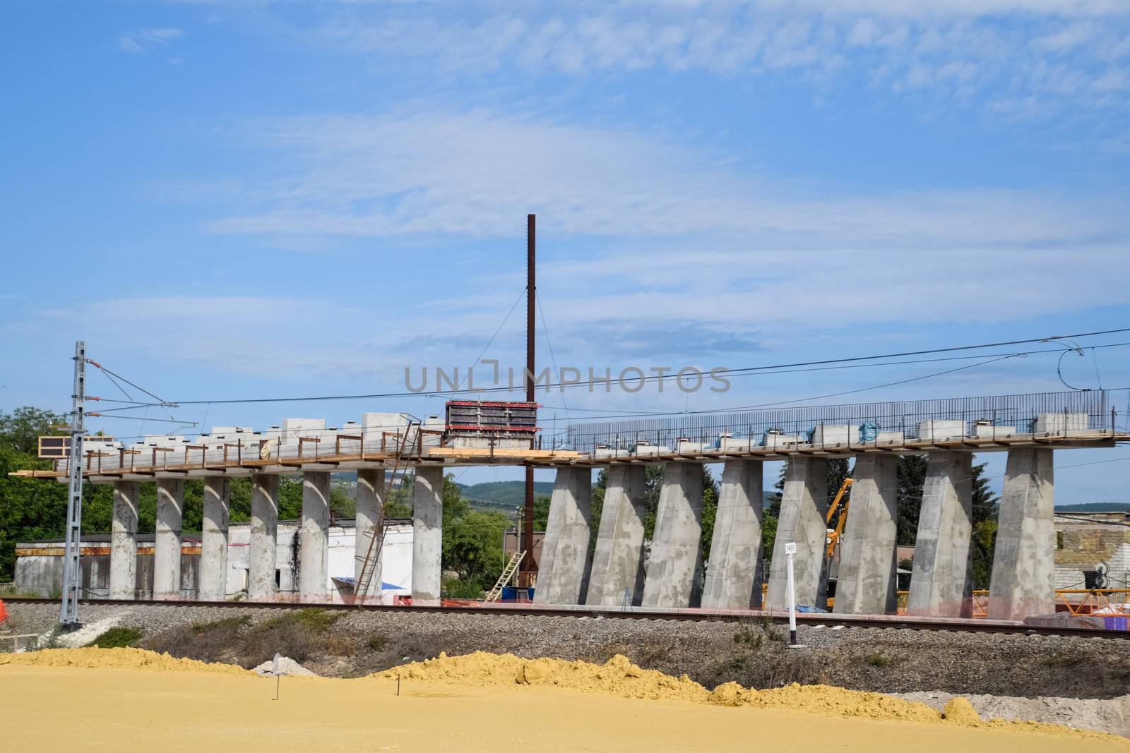 Construction of a new road and transport interchange. Work on reinforced concrete structures and road surface.