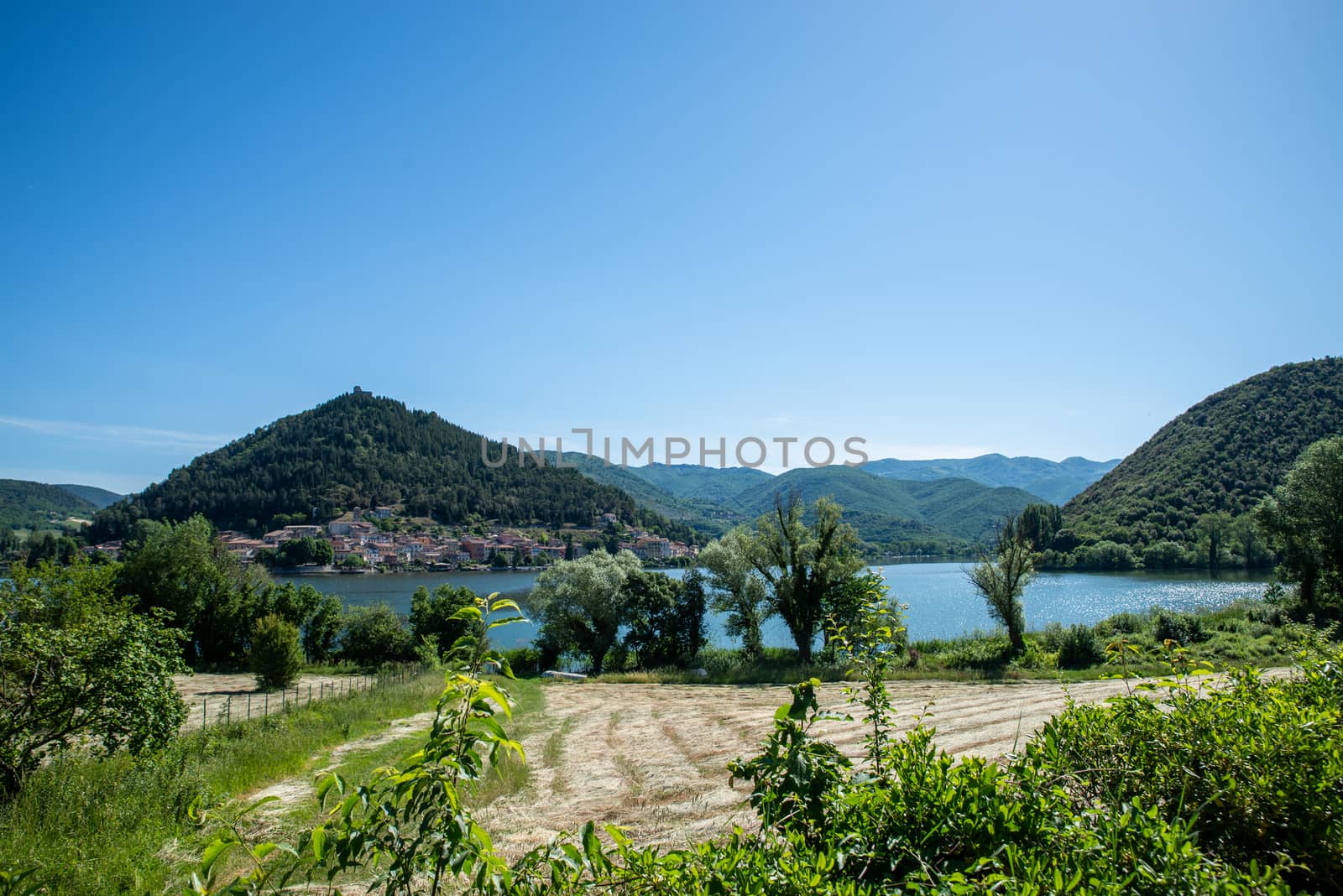 panorama of the village of piediluco seen from the other side of the lake