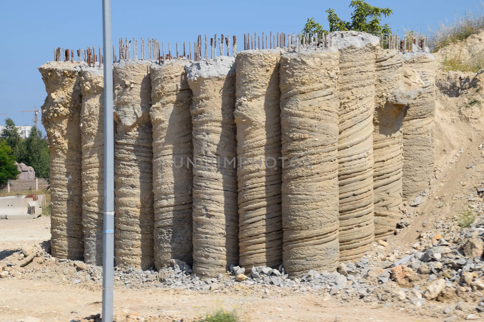 Filling the columns of the future bridge. Construction of a transport interchange.