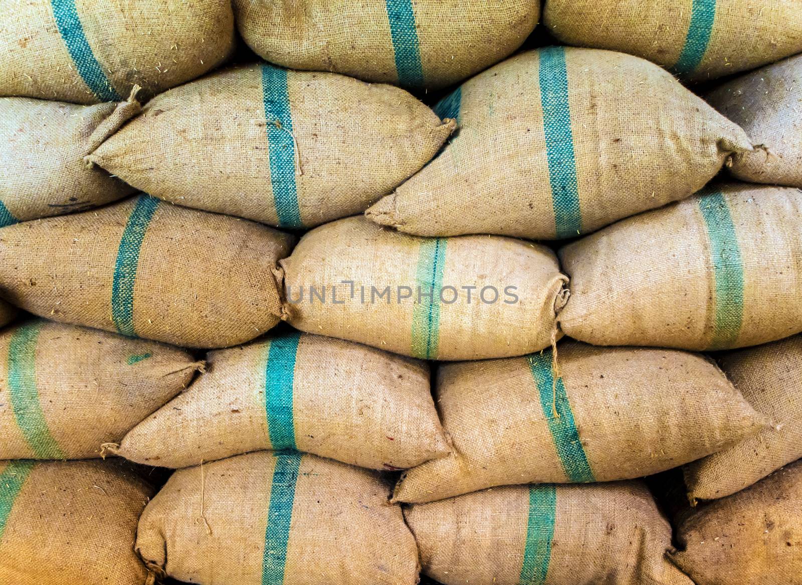 Rice in sacks stacked up a lot