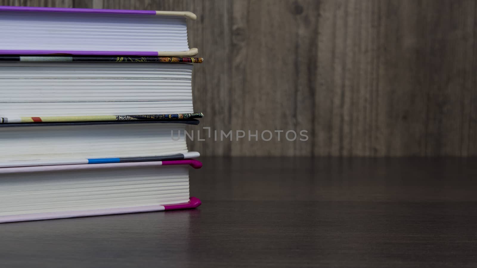 Stack of colorful books for study on wooden table, education, student, student, College, University