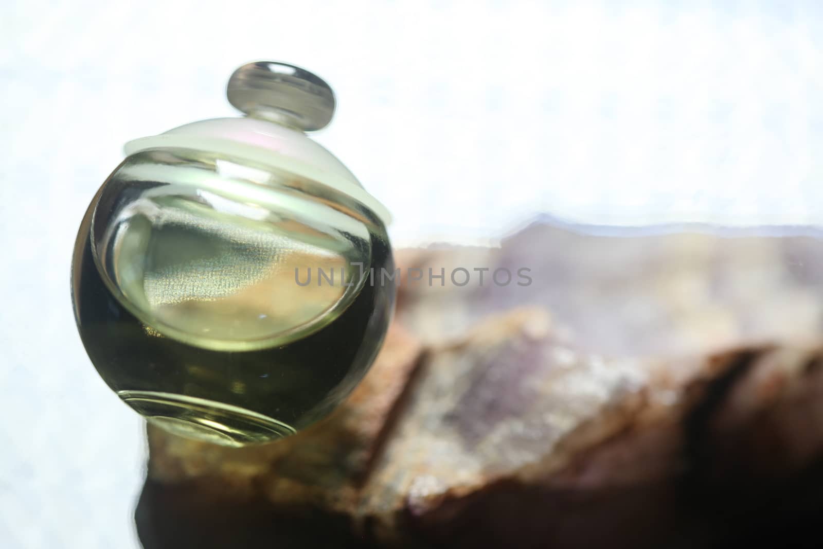 Perfume bottle with golden cap by rajastills