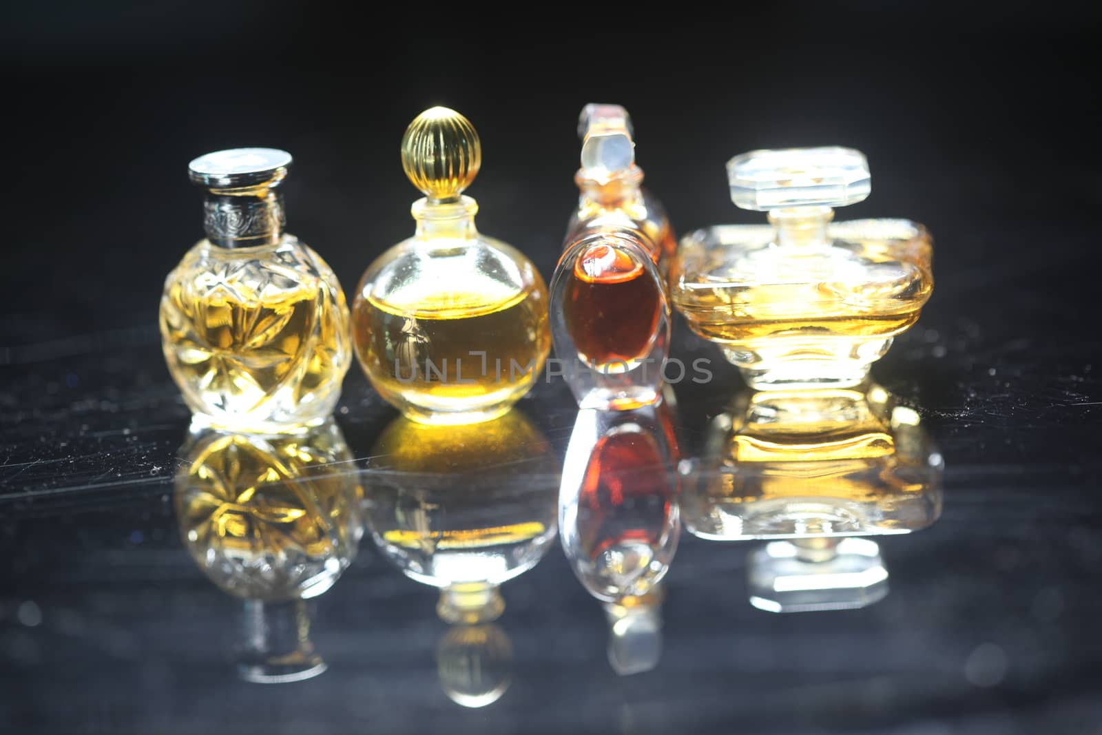 Perfume bottle with golden cap