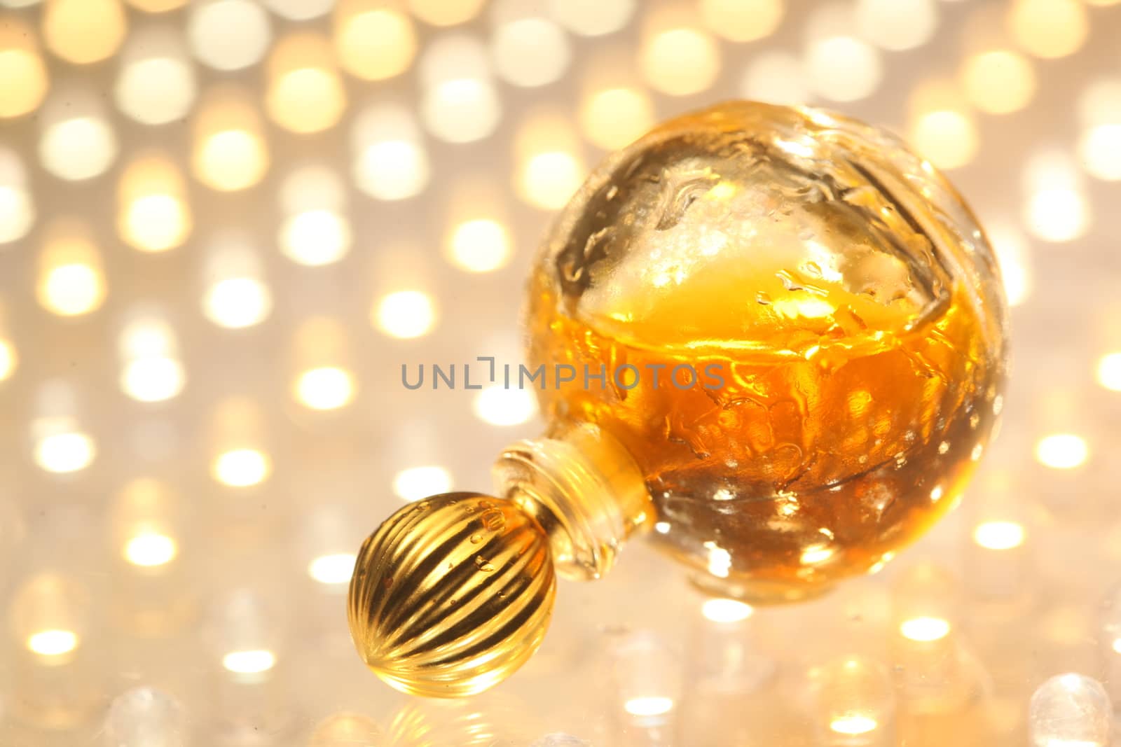 Perfume bottle with golden cap