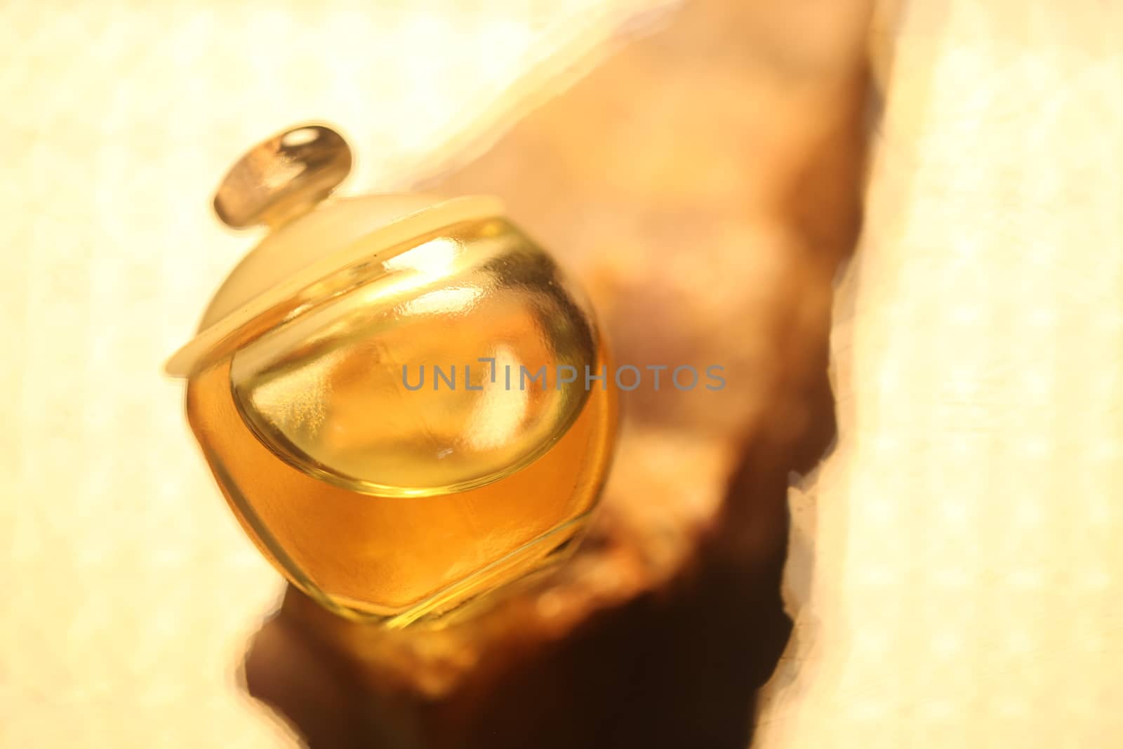 Perfume bottle with golden cap by rajastills