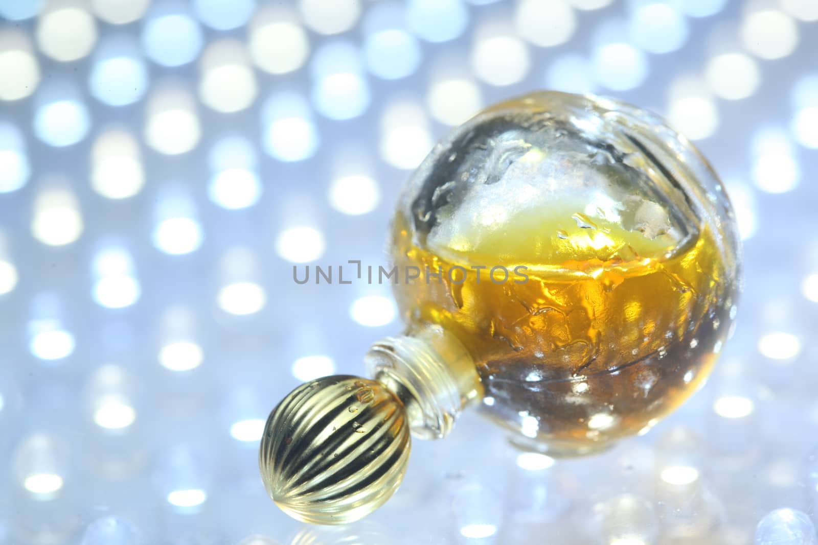 Perfume bottle with golden cap by rajastills