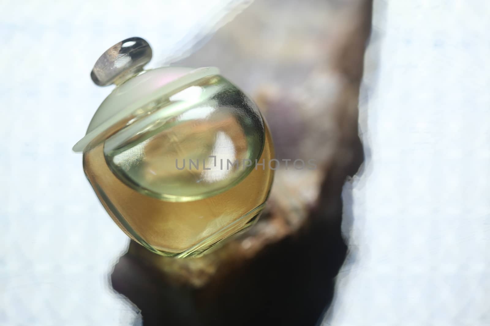 Perfume bottle with golden cap by rajastills