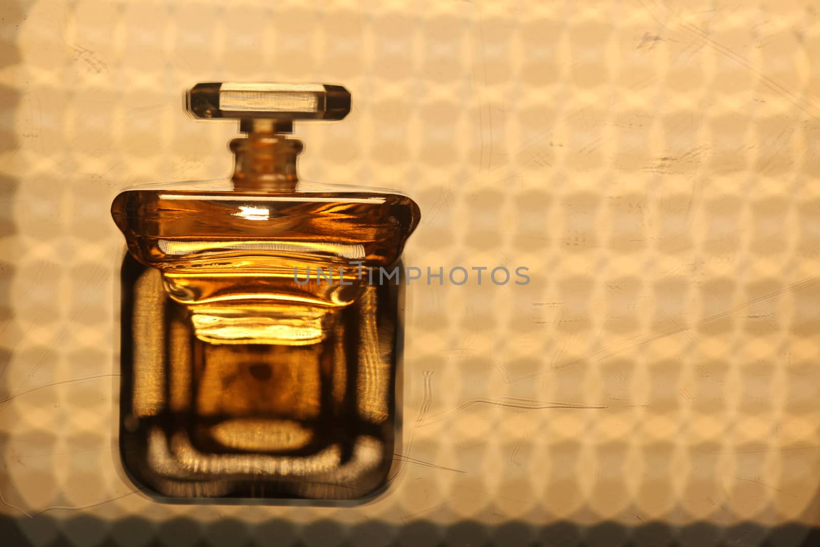 Perfume bottle with golden cap by rajastills