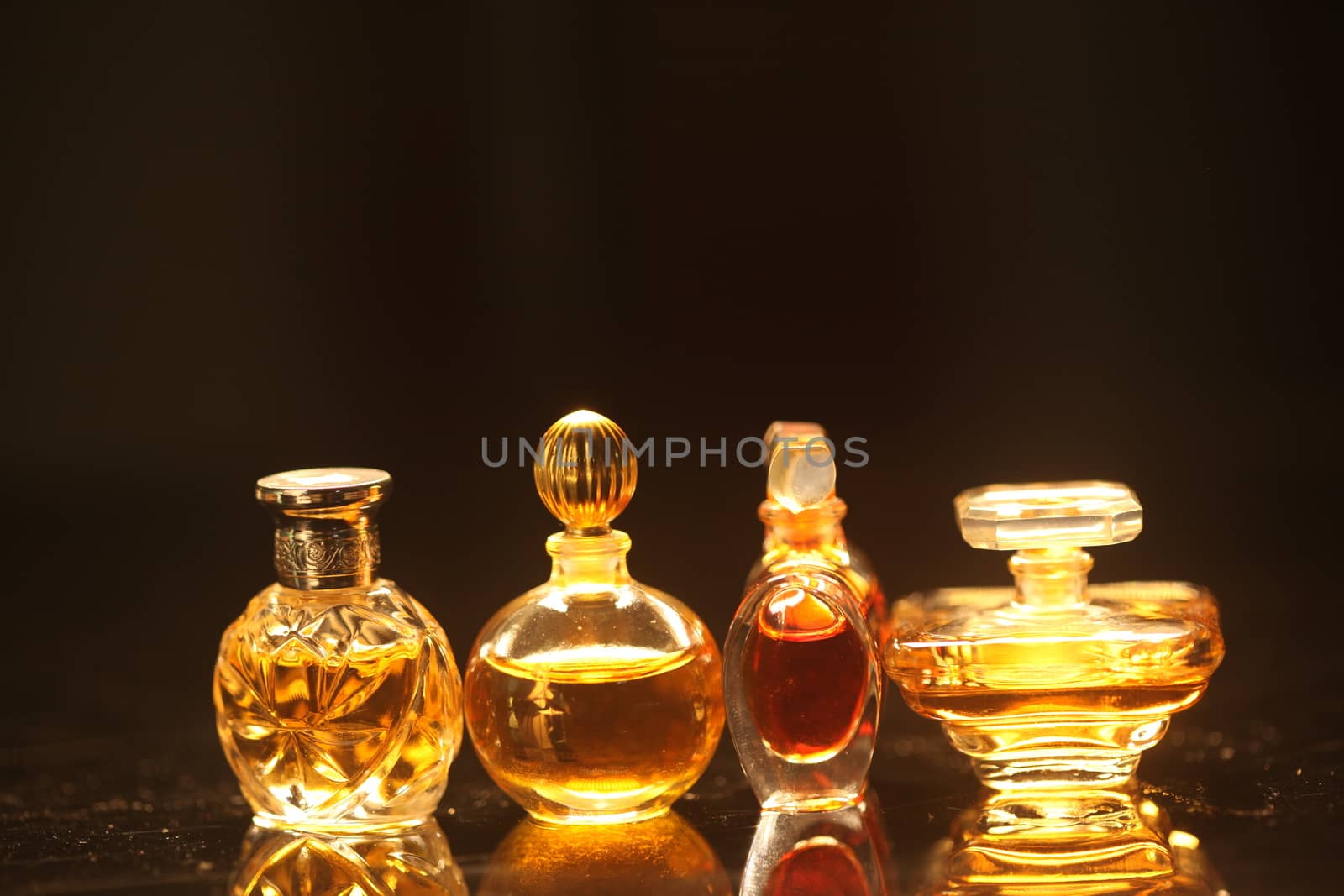 Perfume bottle with golden cap by rajastills