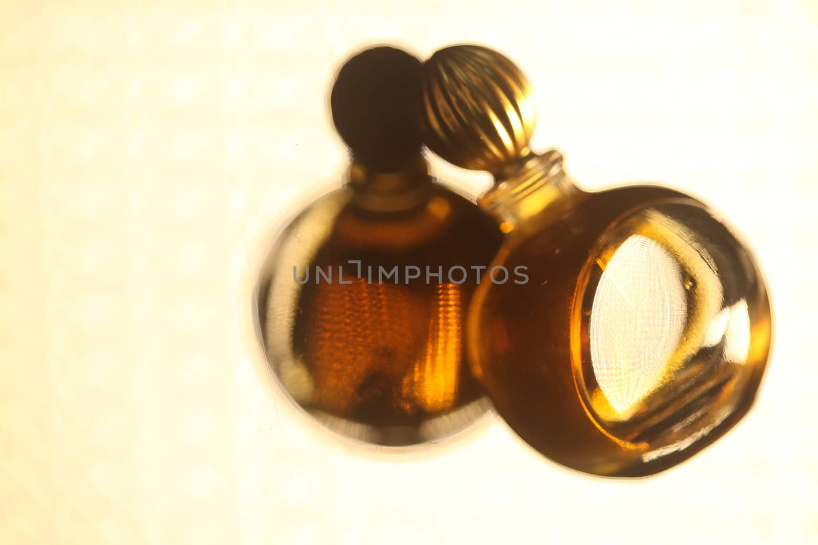 Perfume bottle with golden cap