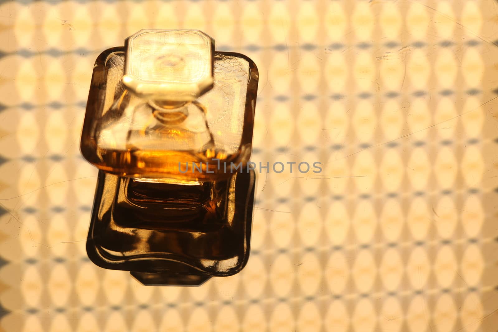 Perfume bottle with golden cap by rajastills