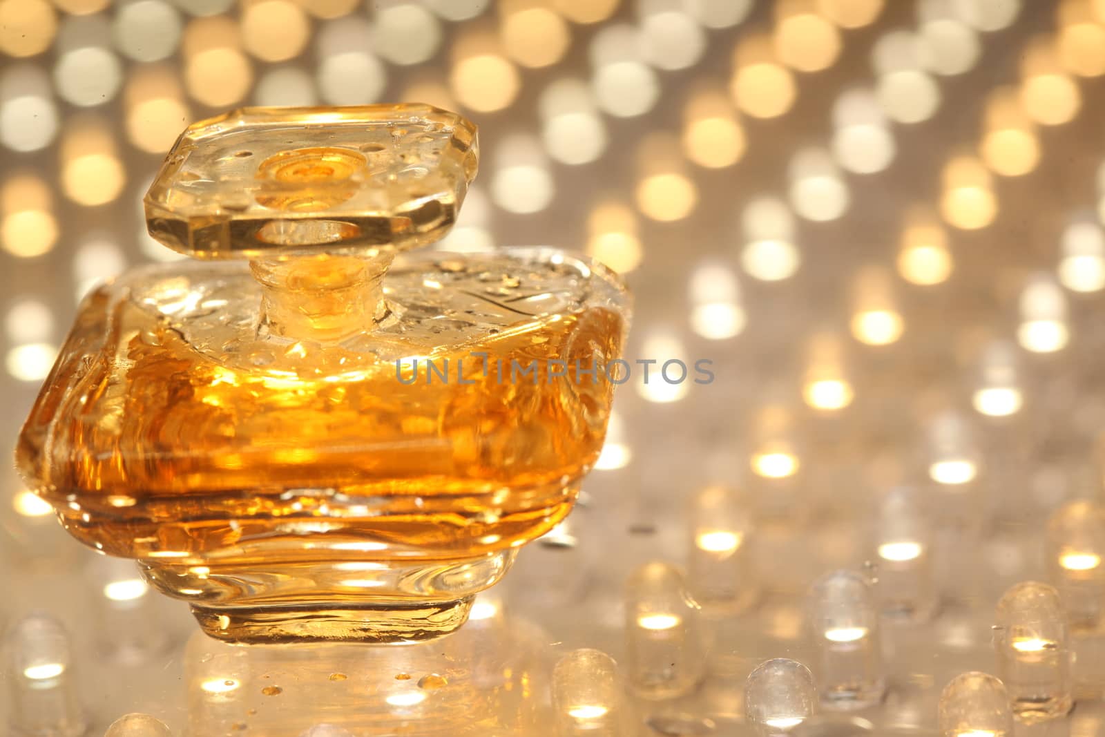 Perfume bottle with golden cap by rajastills