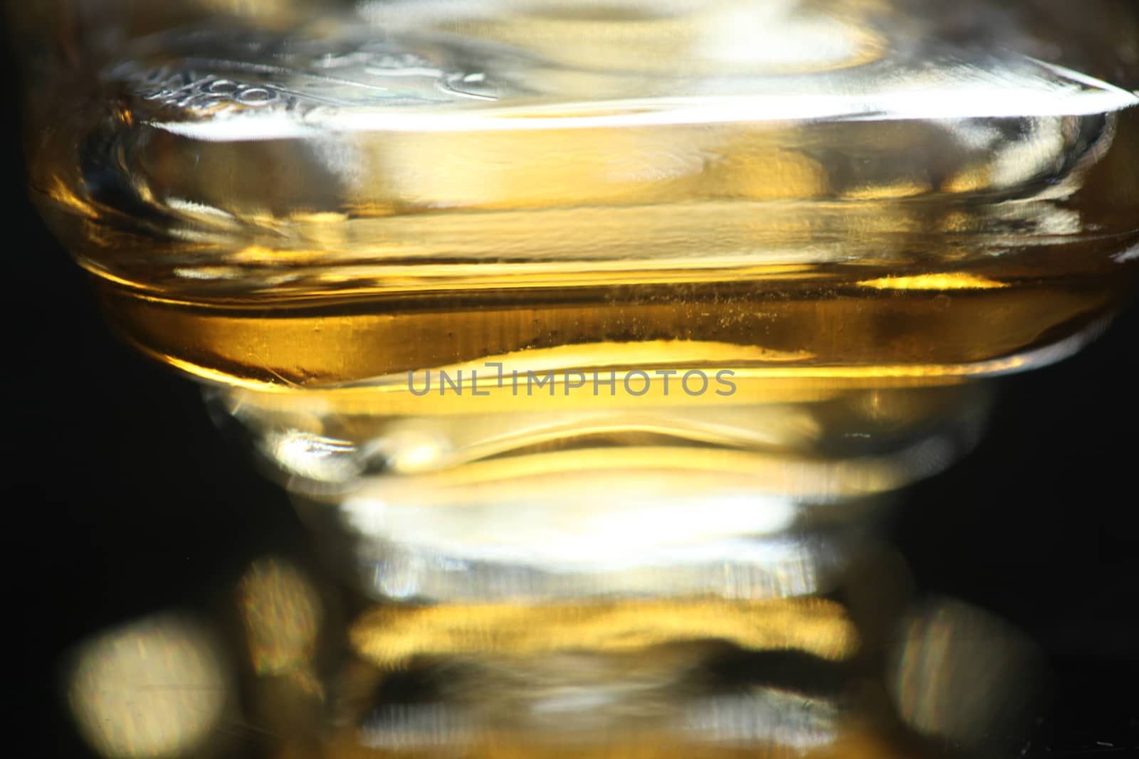 Perfume bottle with golden cap by rajastills