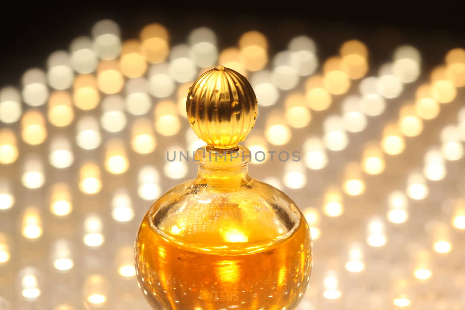 Perfume bottle with golden cap