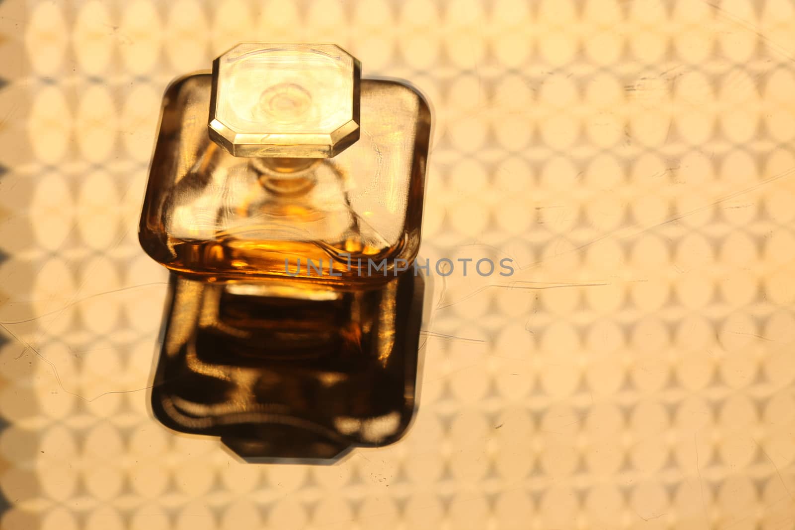 Perfume bottle with golden cap by rajastills