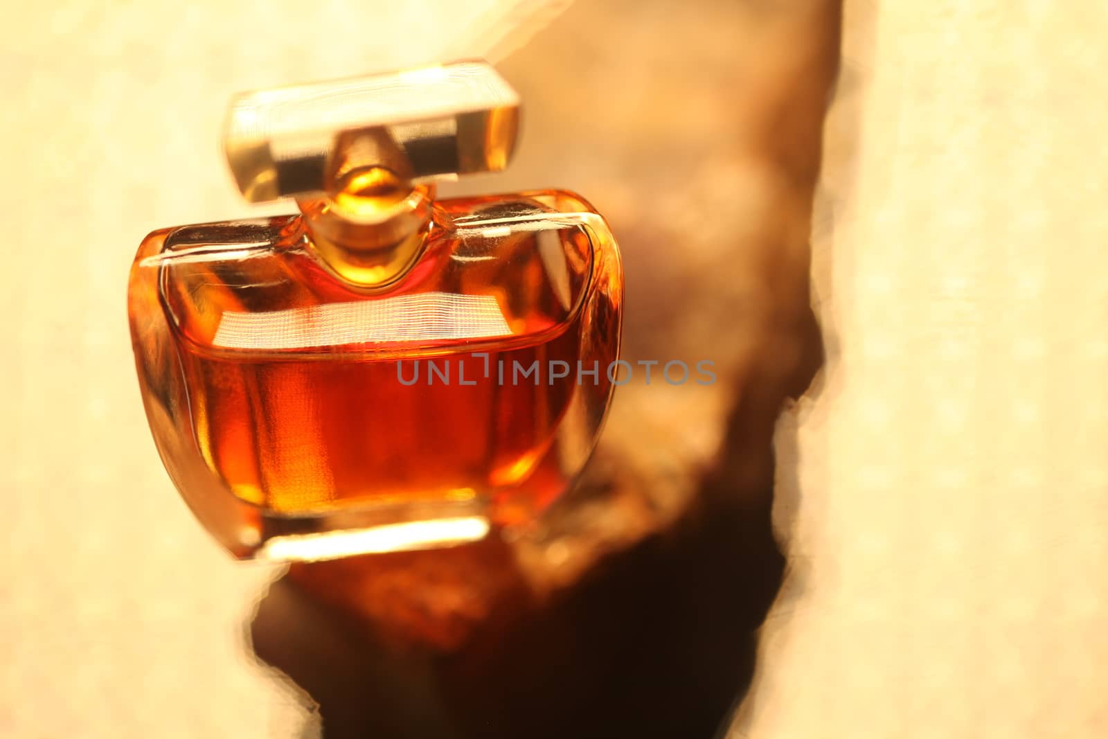 Perfume bottle with golden cap