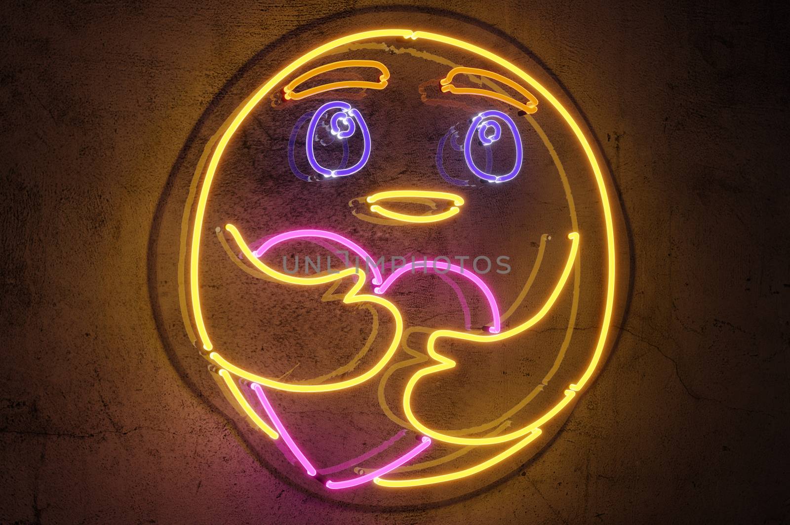 3d rendering  , Neon sign background " Care Emoji " Sign hanging on a wall and lit brightly.