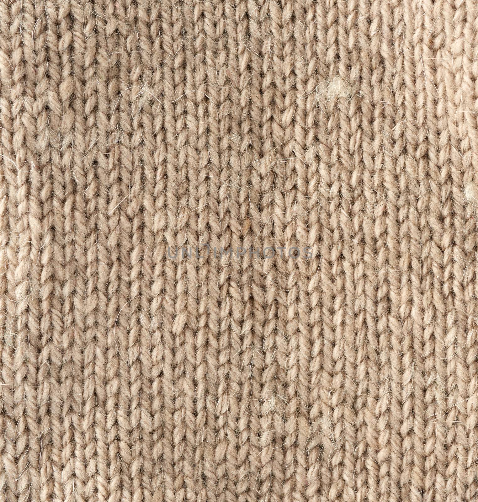 fragment of knitted fabric from light brown wool of a sheep by ndanko