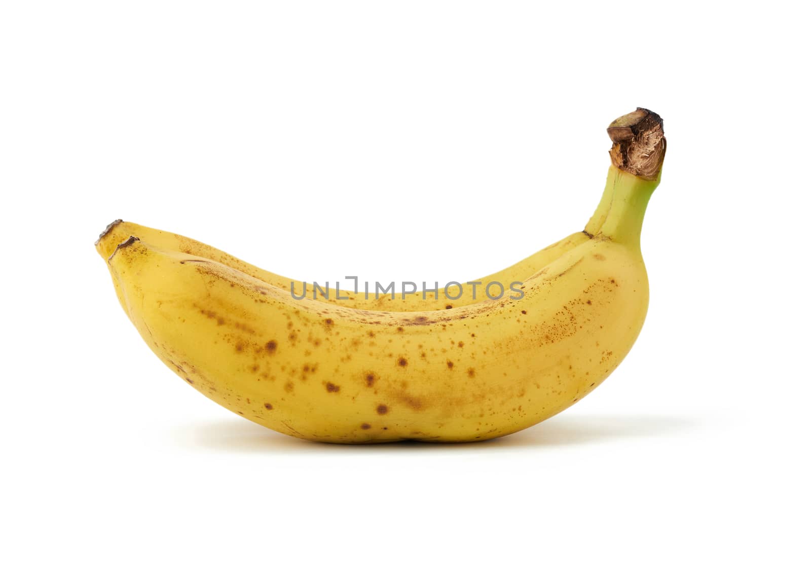 two yellow ripe bananas are isolated on a white background, on a peel a brown spot, overripe fruit